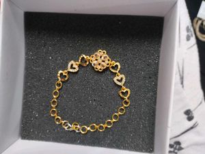 Gold Plated Bracelet with Heart Charms