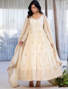 White Anarkali suit with golden embriodery