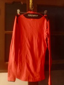 Bright Orange Long Sleeve Turtleneck Top