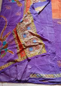 Vibrant Purple Saree with Floral Embroidery