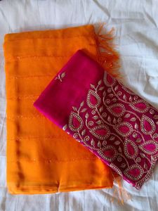Vibrant Orange Saree with Embellished Blouse