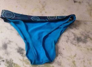 Stylish Blue Bikini Bottoms with Geometric Trim