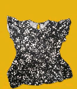 Chic Black & White Speckled Peplum Top