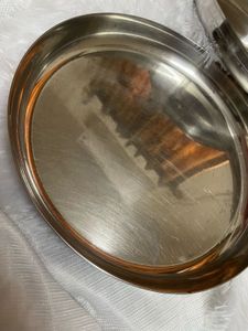 2 heavy steel dinner plates
