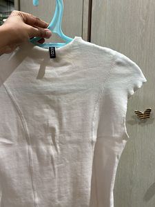 White Ribbed Sleeveless Mock Neck Top