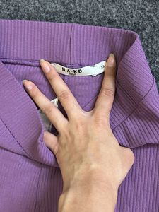 combo of  purple ribbed tube top and tights