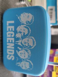 Saregama Carvaan Mini Legends in red, blue green