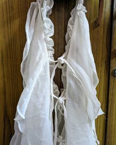 White Ruffled Sleeveless Top