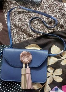 Charming Blue Crossbody Bag with Flower Detail