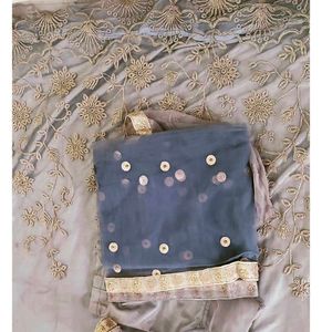 Elegant Embroidered Saree with Tassels