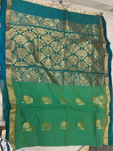 Elegant Teal Saree with Gold Weave