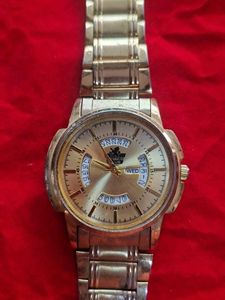 Elegant Gold Tone Watch  need service