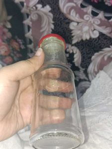 Glass Bottle with Red Lid