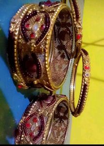 Elegant Gold and Ruby Bangle