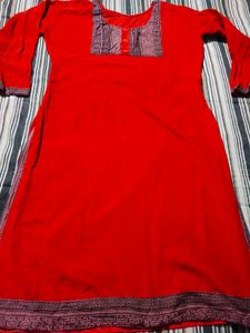 Vibrant Red Kurta with Intricate Neckline