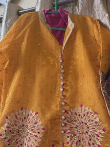 Elegant Yellow Kurta with Pink Accents