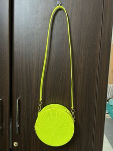 never used Neon Round Crossbody Bag