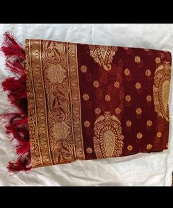 Elegant Maroon Organza saree with tassel