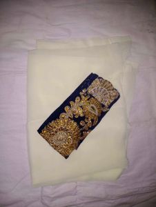 Elegant Cream Saree with Gold Embroidery