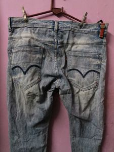 Distressed Light Wash Denim Jeans