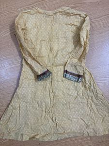 Beautiful Yellow Embroidered Kurta with churidar