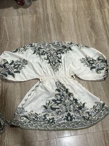 Elegant White Embroidered Gown