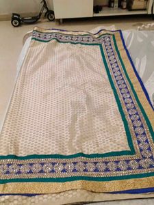 Embellished Beige Saree with Blue Border