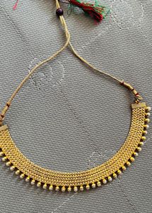 gold jewellery necklace with earrings