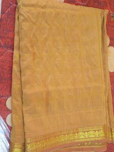 Elegant Gold Checkered Saree