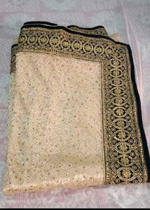 Elegant Beige Embroidered Saree