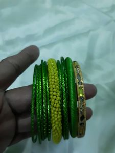 Set Of 13 Metal And Thread Fashion Bangles