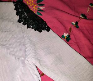 Embellished Peplum Top
