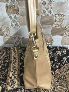 Stylish Gold Crossbody Bag Thoda damage hai photos