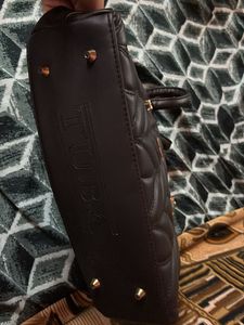 Black quilted handbag