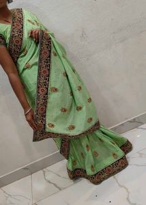 heavy party wear saree Light Green Embellished