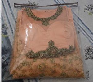 Stunning Embellished Peach Ethnic Gown