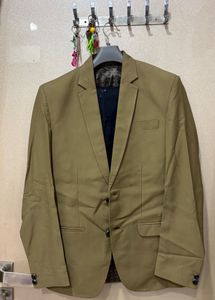 Men's Khaki two piece suit.