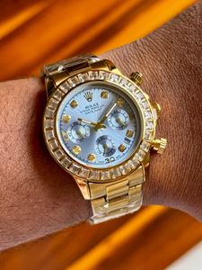 Gold Rolex Daytona Watch with Diamonds