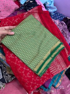 Vibrant Red Saree with Intricate Silver Weave