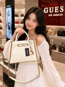 GUESS* *QUILTED SELA SMALL GIRLFRIEND SATCHEL BAG*