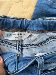 Distressed Blue Denim Jeans