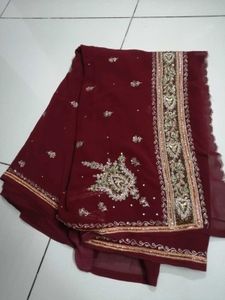Elegant Maroon Embroidered Saree