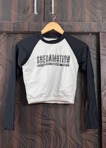 Trendy Cropped Long Sleeve Top