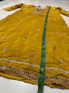 Exquisite Yellow Kurta with Intricate Embellishmen