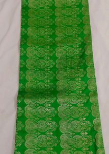 Vibrant Green Silk Saree with Golden Border