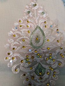 Elegant Cream Embroidered Saree