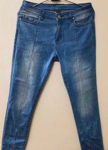 Beige Trousers And Blue Denims