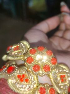 Golden Bangle with Red Stones