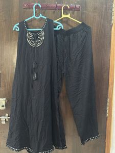 Elegant Black Kurta Set with Embellishments