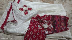 Elegant white Saree with Red Border